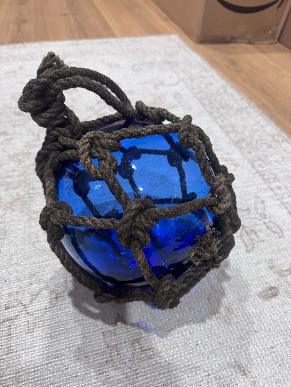 Vintage Blue Glass Fishing Float with Brown Rope Net - Decorative Home Accent